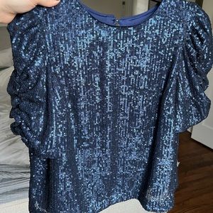 Beautiful deep blue short sleeve sequin blouse by Anthropologie